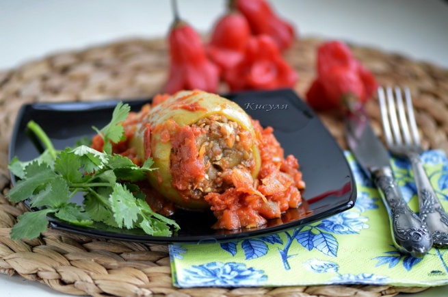 Peppers stuffed with buckwheat, mushrooms and cheese